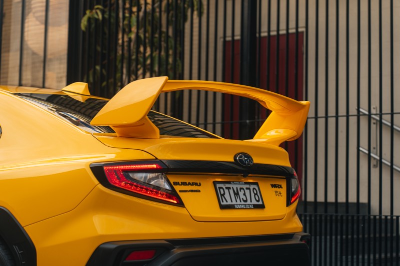 WRX Senkō rear large spoiler in cityscape