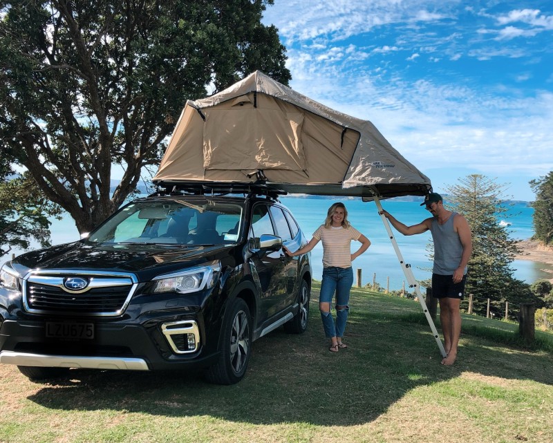 Art and Matilda Green camping with their Subaru Forester.