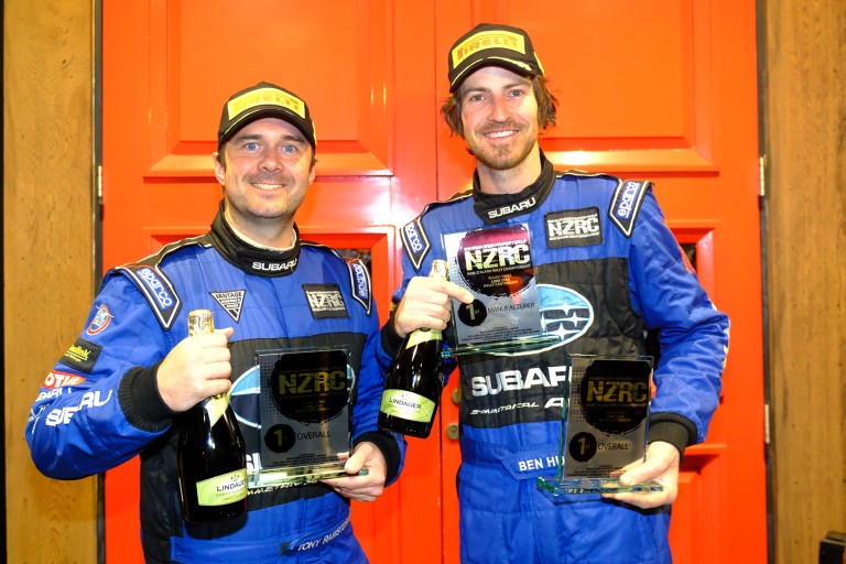 Holding up their third NZRC category win trophy from three rallies, co-driver Tony Rawstorn (left) and Ben Hunt have a healthy lead in the championship. PHOTO: GEOFF RIDDER.