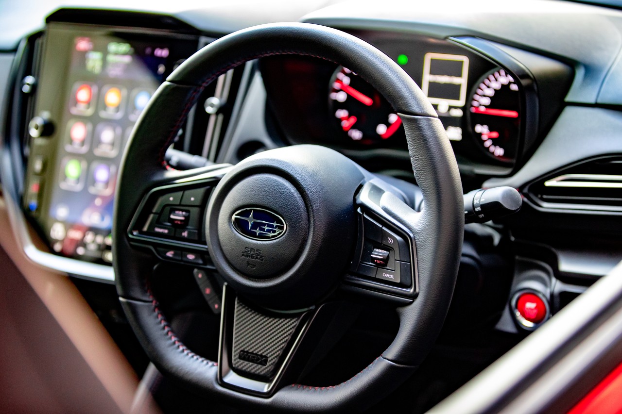 A STI push button start is one of the WRX AKA's 10 additional features.