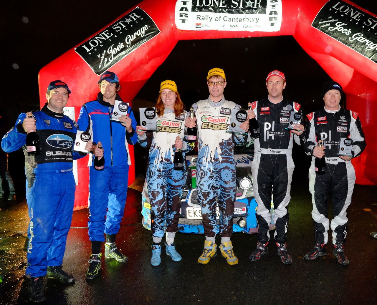 The New Zealand Rally Championship podium (from left) features Tony Rawstorn and Ben Hunt in second place, fellow Subaru team and event winners Nicole and Matt Summerfield and Josh Marston and co-driver Andrew Graves in third. PHOTO: GEOFF RIDDER