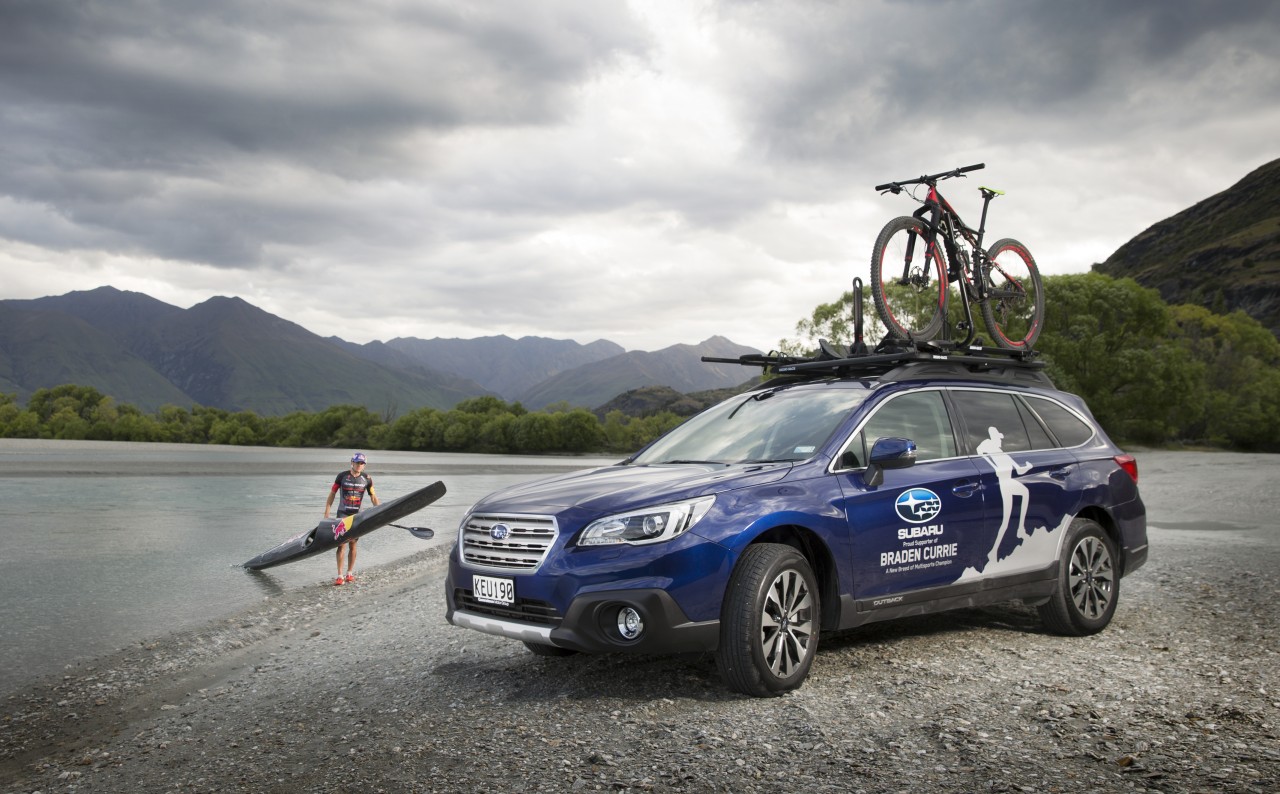 Subaru Brand Ambassador Braden Currie with his Subaru Outback, which has enabled him to ‘do’ his very best to prepare for a fourth Kathmandu Coast to Coast victory in February. PHOTO FREE FOR EDITORIAL USE.