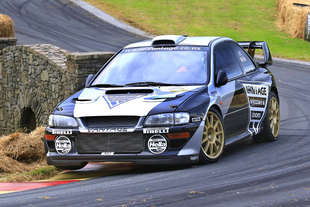 Vantage Subaru driver Alister McRae lifts a wheel on the car as he hurtles up the hill to win the Leadfoot Festival  in 49.15secs today. PHOTO: GREG HENDERSON