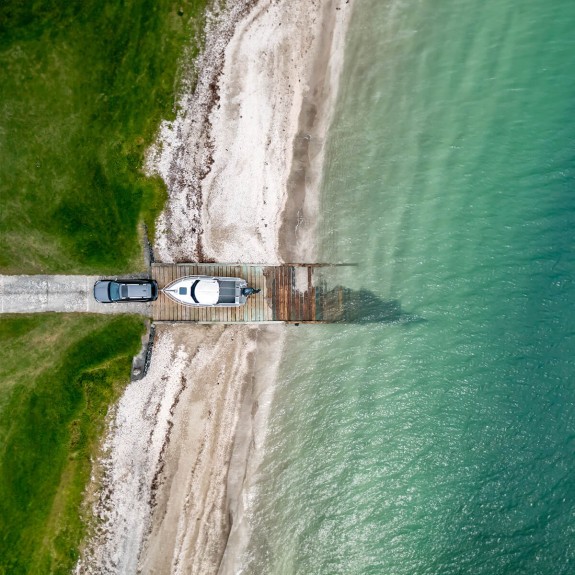 Subaru Outback XT towing a boat | birds eye view