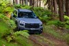 Subaru Outback in River Rock Pearl in forest